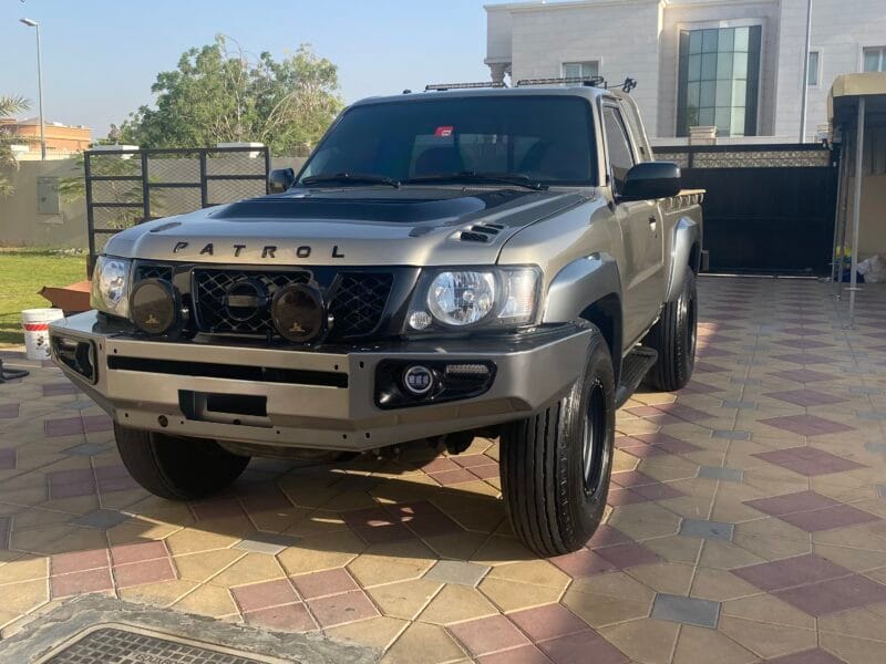 Nissan Patrol Y61 Pickup, with amazing body kit, 4inches lifted king shocks, two LCD screen with apple car play and cruise control