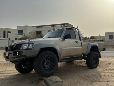 Nissan Patrol Y61 Pickup, with amazing body kit, 4inches lifted king shocks, two LCD screen with apple car play and cruise control