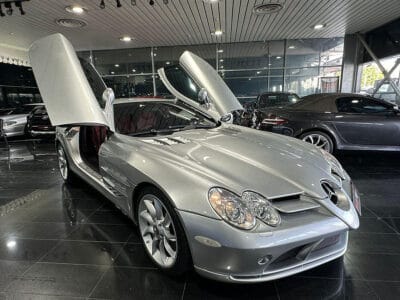 Mercedes-Benz SLR 2006 a high-performance grand tourer, a collaboration between Mercedes-Benz and McLaren, featuring a 5.4-liter supercharged V8 engine producing around 617 horsepower