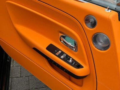 2025 Rolls-Royce Spectre 650 hp 485 kW and 793 lb‑ft 1,075 Nm Black Orange