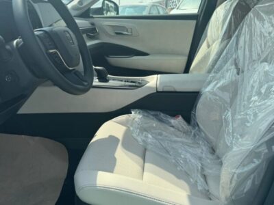 2023 Toyota Crown 2.4-litre turbocharged Hybrid inline-4 engine White Beige