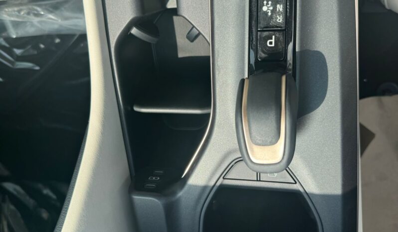 2023 Toyota Crown 2.4-litre turbocharged Hybrid inline-4 engine White Beige