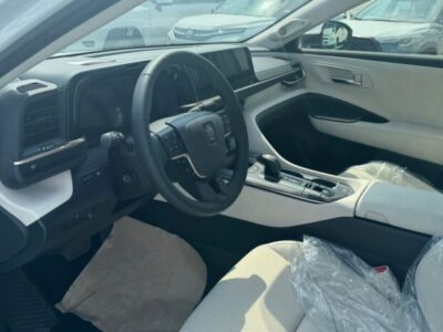 2023 Toyota Crown 2.4-litre turbocharged Hybrid inline-4 engine White Beige