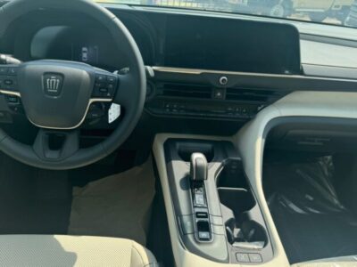 2023 Toyota Crown 2.4-litre turbocharged Hybrid inline-4 engine White Beige