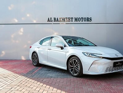 2024 Toyota Camry GLX Hybrid Sedan White Tan