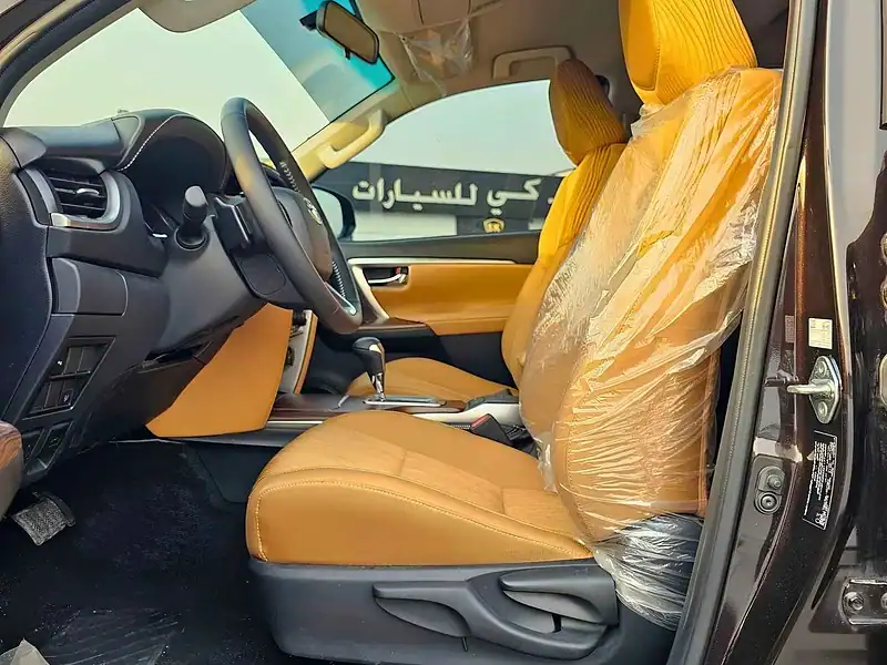 2025 Toyota Fortuner 2.7L V4 PETROL FULL OPTION GCC Specs Brown Tan