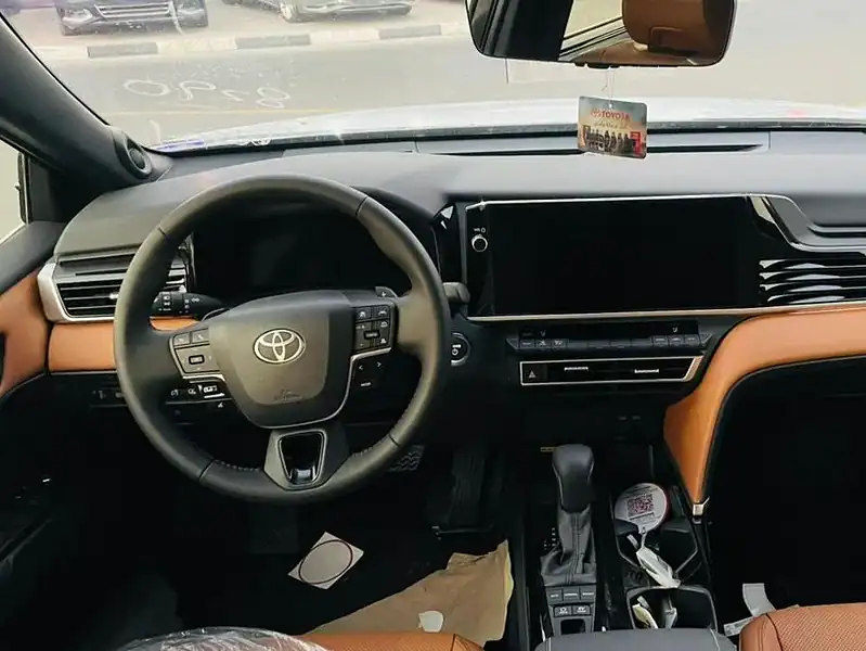 2025 Toyota Camry CAMRY 2.5 HYBRID GCC Specs Blue Tan