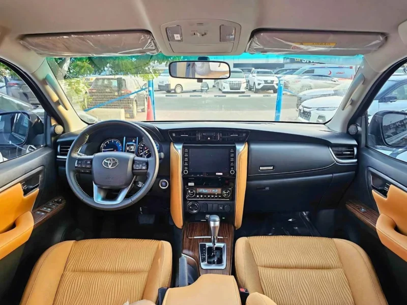 2025 Toyota Fortuner 2.7L V4 PETROL FULL OPTION GCC Specs Brown Tan