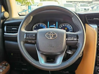 2025 Toyota Fortuner 2.7L V4 PETROL FULL OPTION GCC Specs Brown Tan