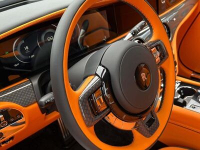 2025 Rolls-Royce Spectre 650 hp 485 kW and 793 lb‑ft 1,075 Nm Black Orange