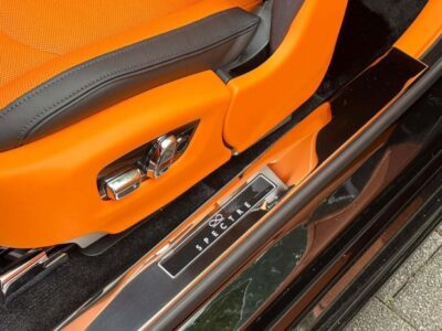 2025 Rolls-Royce Spectre 650 hp 485 kW and 793 lb‑ft 1,075 Nm Black Orange