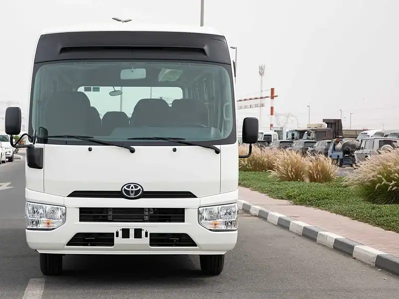 2025 Toyota Coaster HI ROOF 23S D 4.0L MT STD RD White Brown