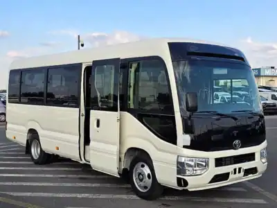 2026 Toyota Coaster VIP 4.2l diesel MT 22 Seats Electric Door White Brown