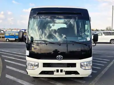 2026 Toyota Coaster VIP 4.2l diesel MT 22 Seats Electric Door White Brown