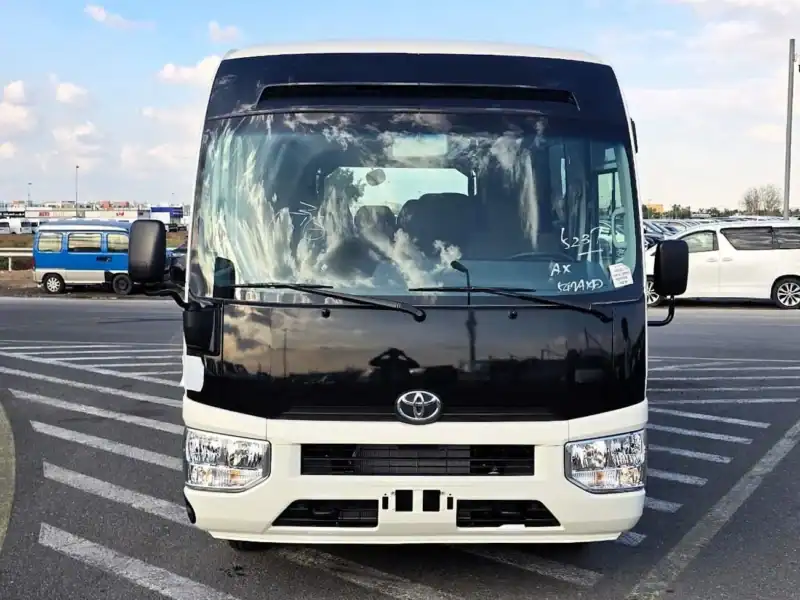 2026 Toyota Coaster VIP 4.2l diesel MT 22 Seats Electric Door White Brown