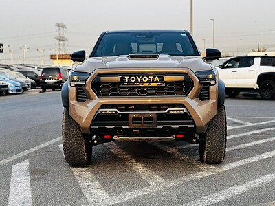 2025 Toyota Tacoma 2.4L TRD PRO TOP OPTION Hybrid Beige Black