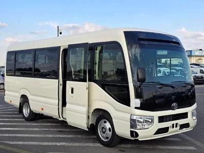 2026 Toyota Coaster VIP 4.2l diesel MT 22 Seats Electric Door White Brown