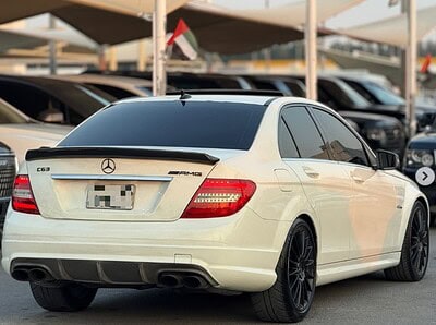 2010 Mercedes-Benz C 63 AMG 6.2L AMG V8 Gul Carbon Fiber White Black