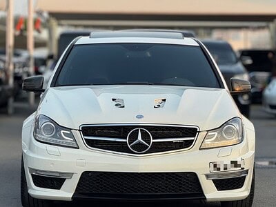 2010 Mercedes-Benz C 63 AMG 6.2L AMG V8 Gul Carbon Fiber White Black