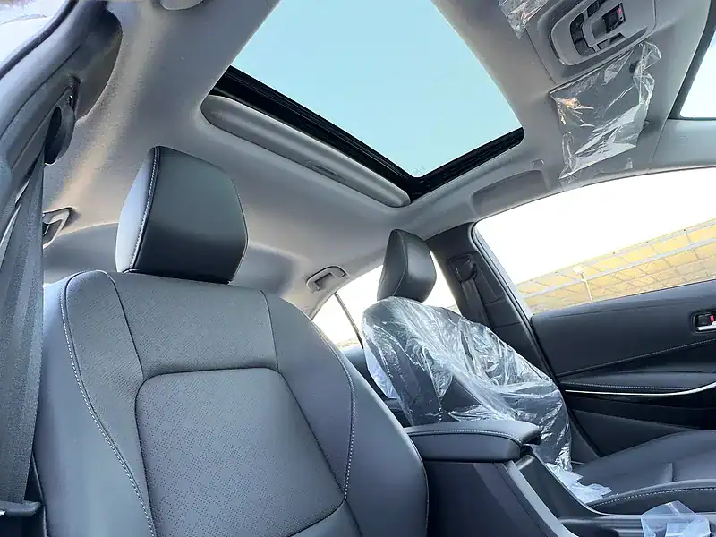 2025 Toyota Corolla SE 1.8L Elite Edition Hybrid 4 Cylinders White Black Sedan