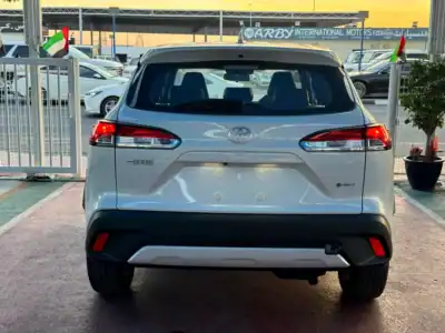 2025 Toyota Corolla Cross Hybrid 4 Cylinders Engine White Black Crossover