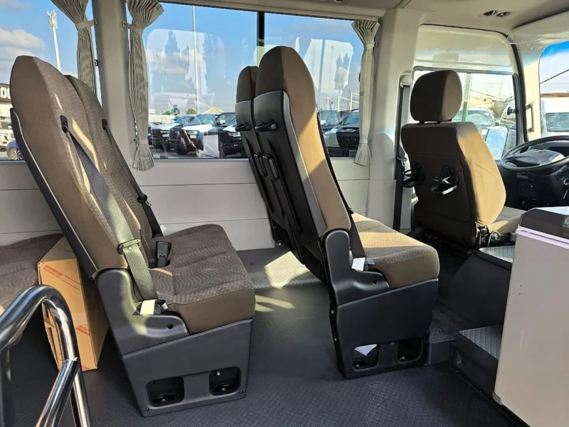 2026 Toyota Coaster VIP 4.2l diesel MT 22 Seats Electric Door White Brown