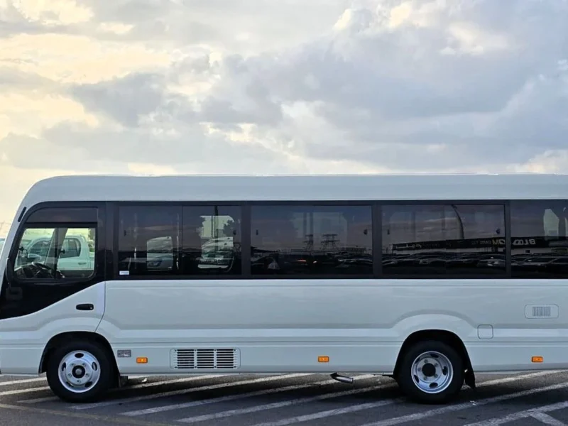 2026 Toyota Coaster VIP 4.2l diesel MT 22 Seats Electric Door White Brown