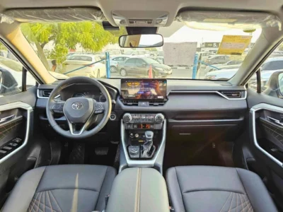 2025 Toyota RAV 4 HYBRID ELITE PLUS E-CVT 2.5L V4 4WD White Black SUV