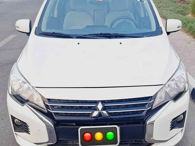 2022 Mitsubishi Attrage GLS 3 Cylinder petrol Engine White Beige Sedan