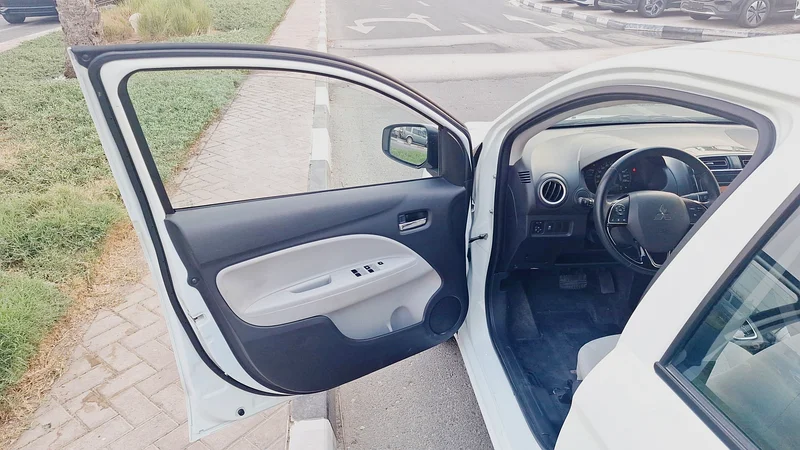 2022 Mitsubishi Attrage GLS 3 Cylinder petrol Engine White Beige Sedan