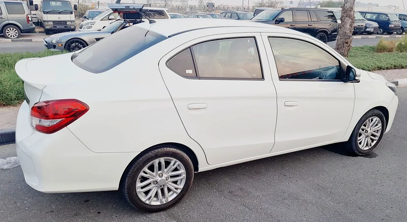 2022 Mitsubishi Attrage GLS 3 Cylinder petrol Engine White Beige Sedan