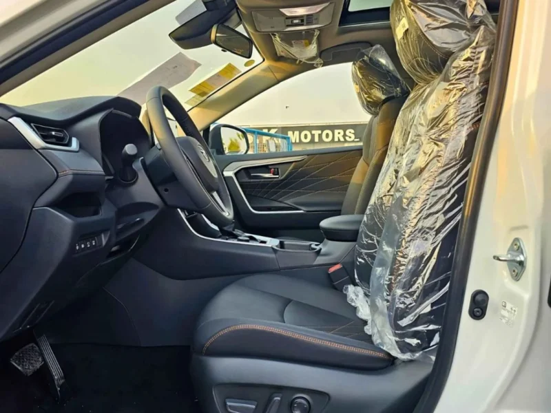 2025 Toyota RAV 4 HYBRID ELITE PLUS E-CVT 2.5L V4 4WD White Black SUV