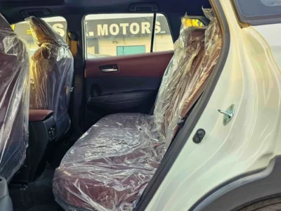 2024 Toyota Corolla Cross HYBRID1.8L AT 4 Cylinders Engine White Tan SUV