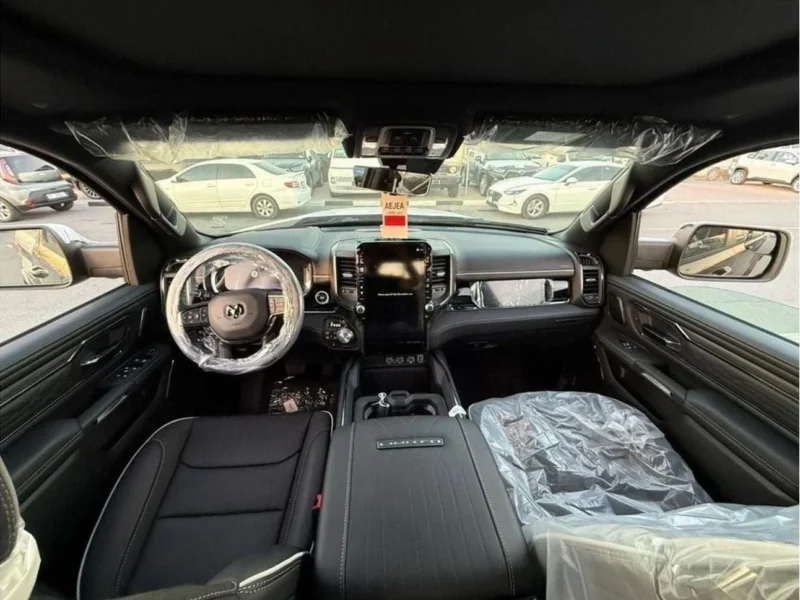 2025 RAM 1500 LIMITED 3.0L 6 Cylinder TWIN TURBO ESS White Black