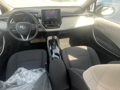 2023 TOYOTA COROLLA 1.6 Litres 4 Cylinders Petrol Engine White Beige Sedan