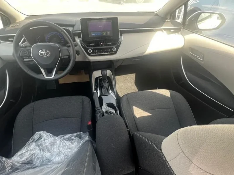 2023 TOYOTA COROLLA 1.6 Litres 4 Cylinders Petrol Engine White Beige Sedan