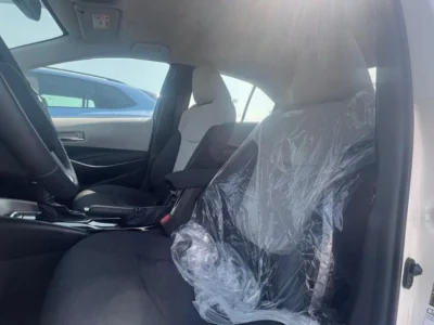 2023 TOYOTA COROLLA 1.6 Litres 4 Cylinders Petrol Engine White Beige Sedan