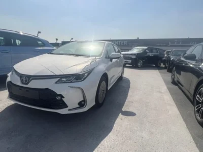 2023 TOYOTA COROLLA 1.6 Litres 4 Cylinders Petrol Engine White Beige Sedan