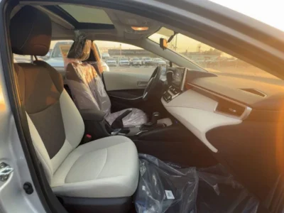 2025 TOYOTA COROLLA GLI HEV 1.8L 4 Cylinders Engine Silver Beige Sedan GCC