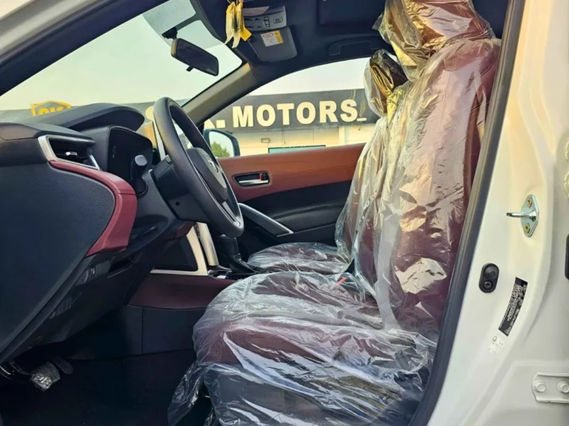 2024 Toyota Corolla Cross HYBRID1.8L AT 4 Cylinders Engine White Tan SUV