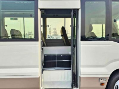 2025 Toyota Coaster 2.7L PETROL MT DUAL TONE 4 Cylinders Engine White Brown Bus