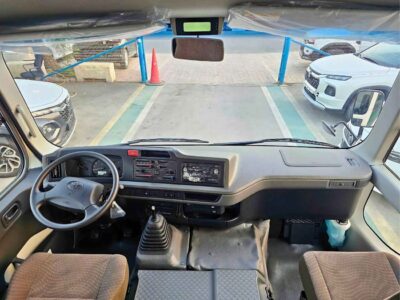 2025 Toyota Coaster 2.7L PETROL MT DUAL TONE 4 Cylinders Engine White Brown Bus