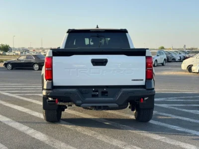 2025 Toyota Tacoma 2.4L V4 TRD PRO I-FORCE MAX Hybrid White Black Pick Up Truck