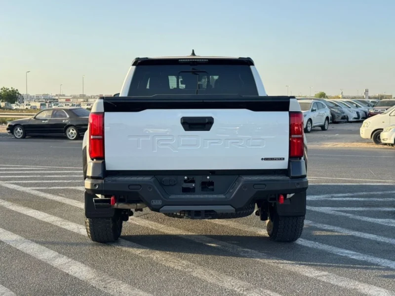 2025 Toyota Tacoma 2.4L V4 TRD PRO I-FORCE MAX Hybrid White Black Pick Up Truck