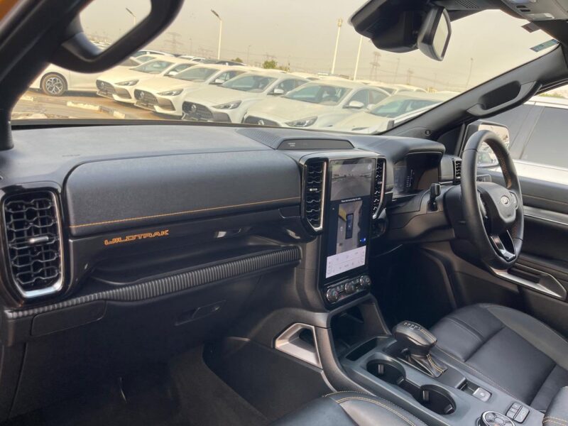 The 2023 Ford Ranger Wildtrak 2.0L Bi-turbo Diesel 4 Cylinders Yellow Black Pick Up Truck