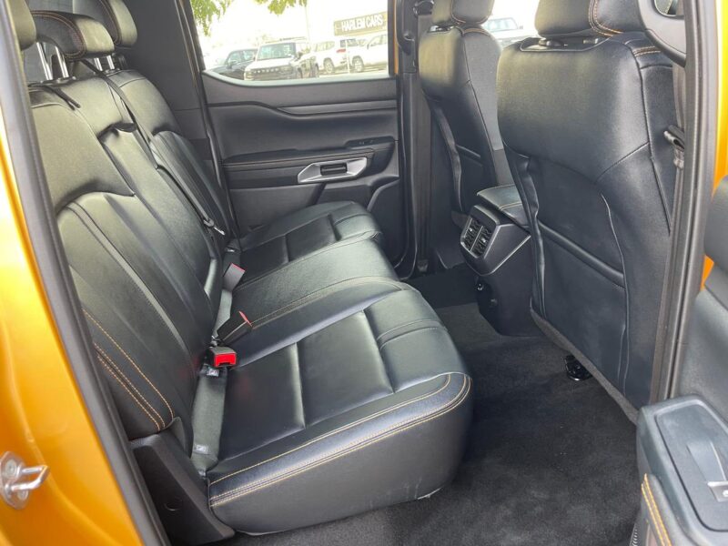 The 2023 Ford Ranger Wildtrak 2.0L Bi-turbo Diesel 4 Cylinders Yellow Black Pick Up Truck