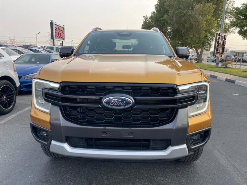 The 2023 Ford Ranger Wildtrak 2.0L Bi-turbo Diesel 4 Cylinders Yellow Black Pick Up Truck