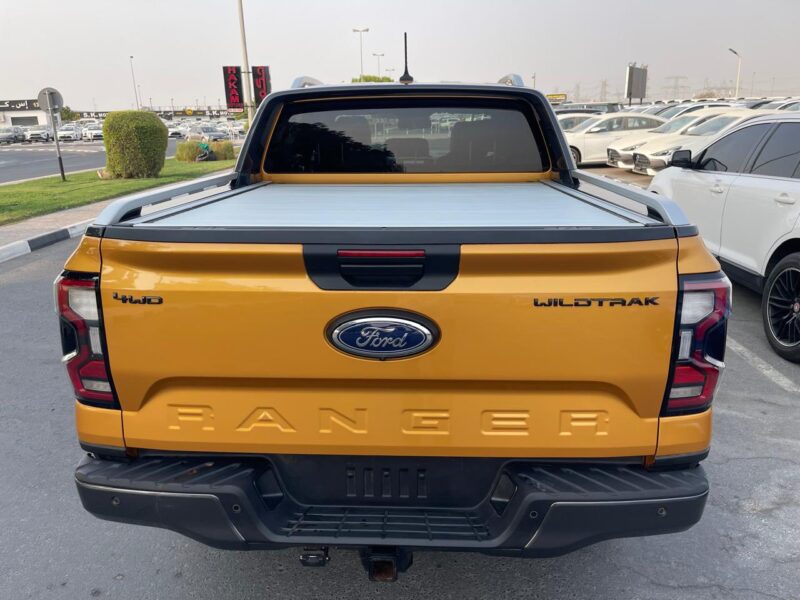 The 2023 Ford Ranger Wildtrak 2.0L Bi-turbo Diesel 4 Cylinders Yellow Black Pick Up Truck