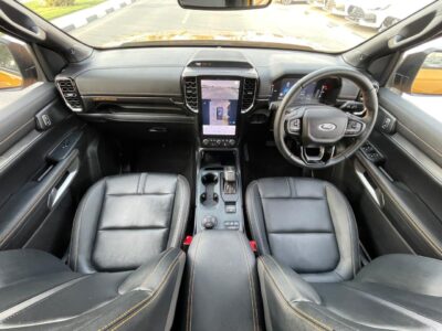 The 2023 Ford Ranger Wildtrak 2.0L Bi-turbo Diesel 4 Cylinders Yellow Black Pick Up Truck