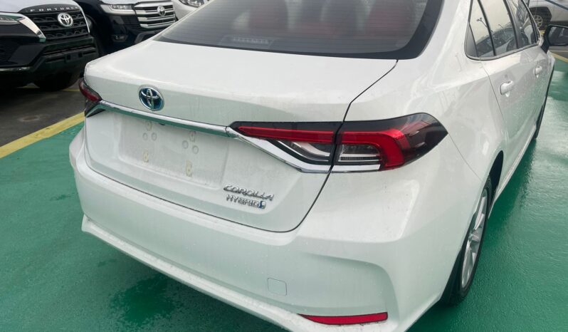 2024 Toyota Corolla 1.8 Litres Hybrid 4-cylinder Engine White Red Sedan AWD